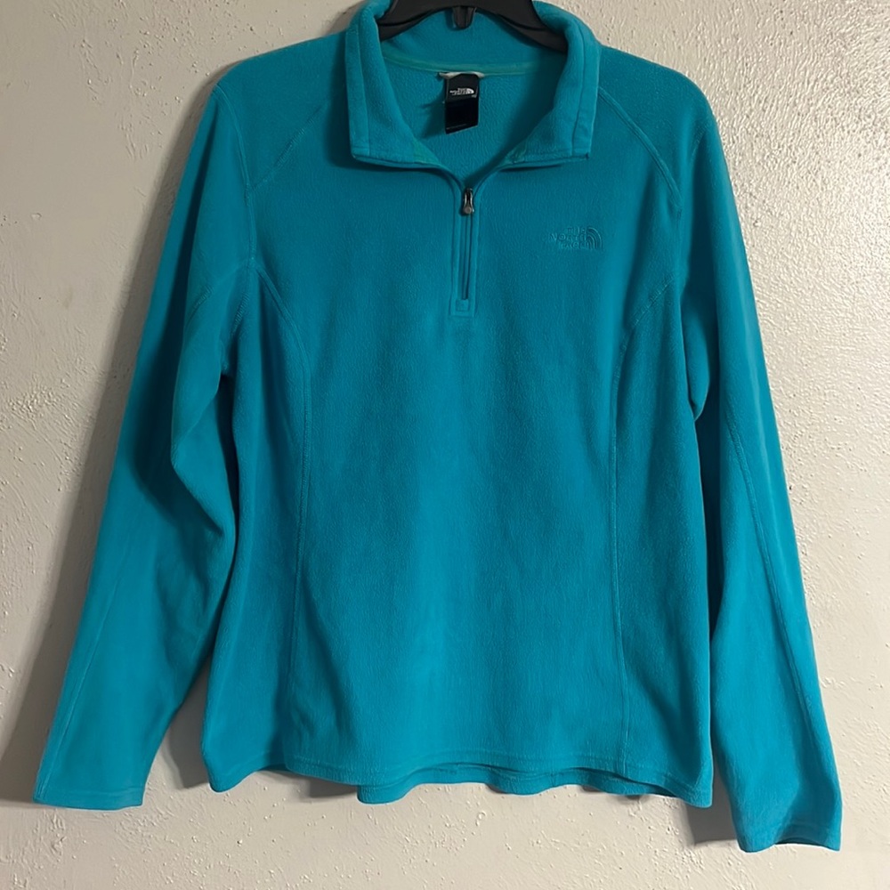 North face, teal women’s large quarter zip long sleeve fleece pull over